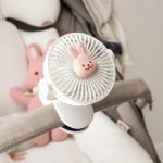 Portable Mini Clip Fan for Baby Strollers; Compact, Rechargeable, and Adjustable Cooling Solution